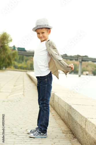 Little boy on the riverside