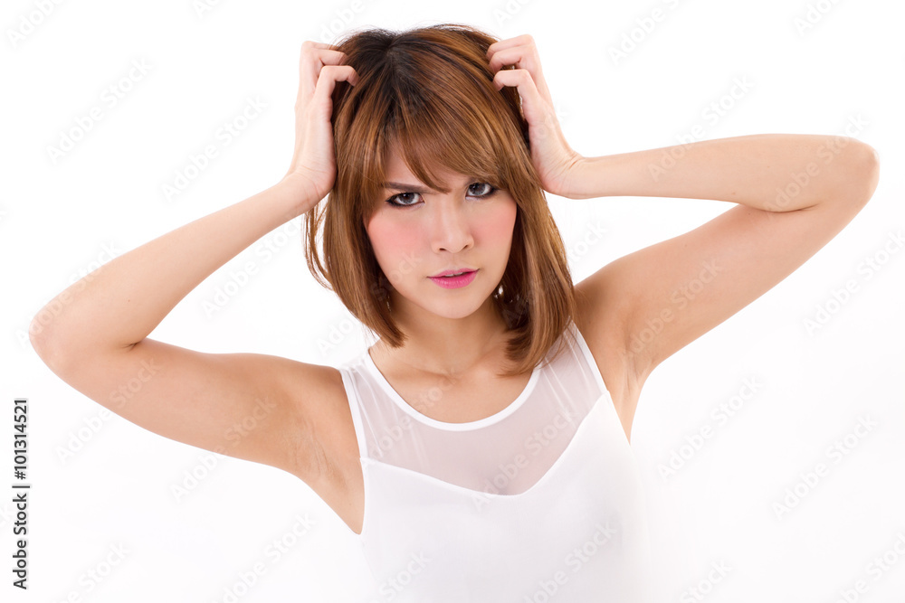 angry, unhappy woman with her hand holding her head