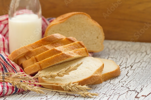 Sliced wheat bread and milk