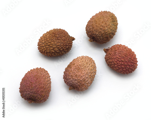 Five rambutan fruits isolated on white background closeup