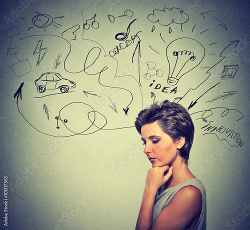 worried young woman thinking dreaming has many ideas looking down