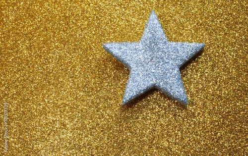 silver star in brilliant yellow background