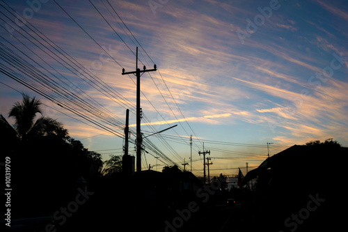 transmission power line on sunset