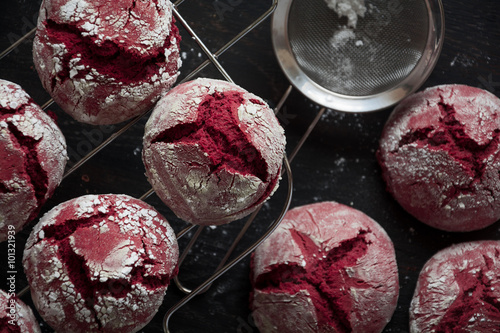 Chocolate 'Red velvet crinkles' cookies in powdered sugar