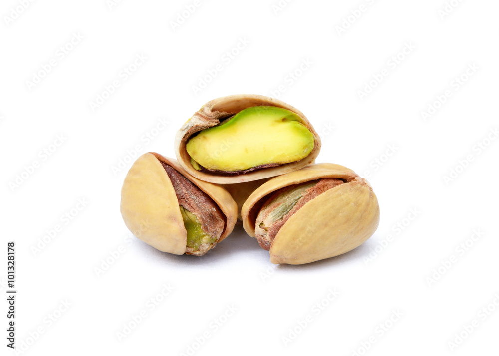 pistachio nuts on a white background pistachio nuts on a white background