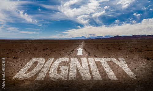 Dignity written on desert road