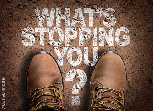 Photography Top View of Boot on the trail with the text: Whats Stopping You?
