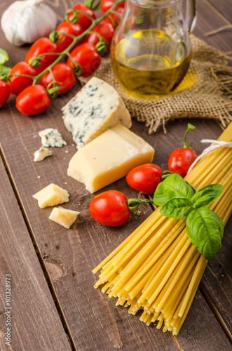Still life photo, background with pasta and cheese