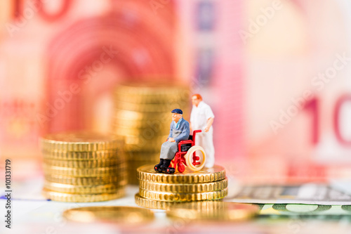 Rollstuhlfahrer, Seniorenfigur auf Münzen