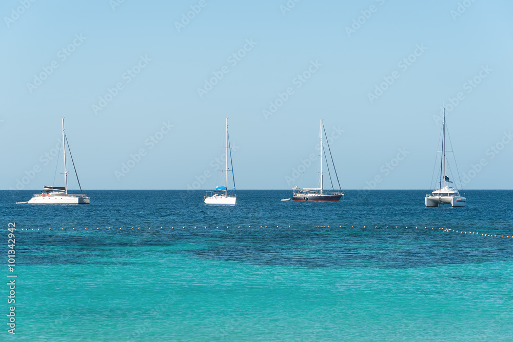 Yacht sailing on tropical sea at windy day