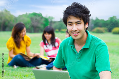 Students hanging out in the park.