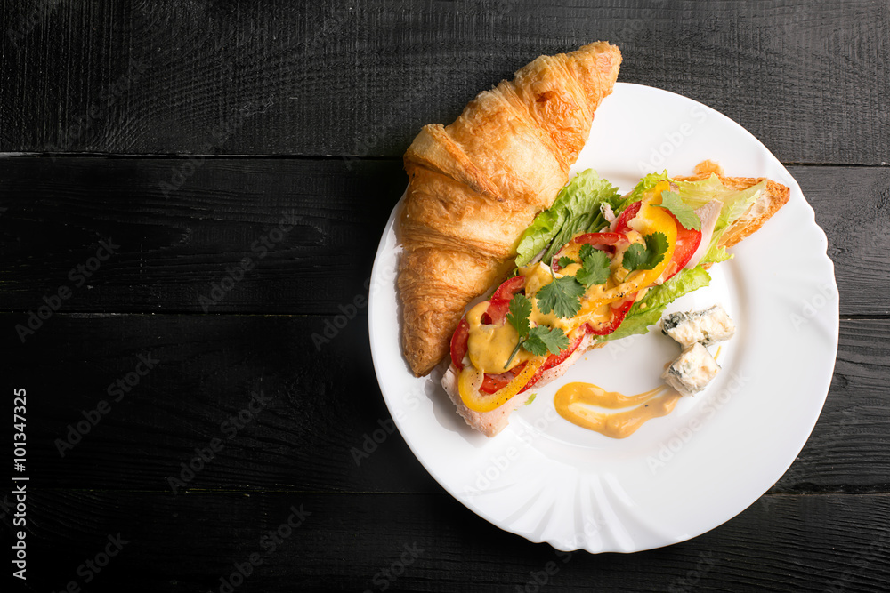 Sandwich made from croissant with chicken Sandwich made from croissant with chicken