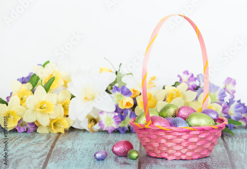 Chocolate eggs in a pink Easter basket
