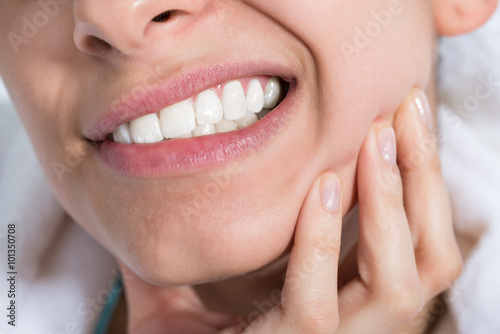 Woman Suffering From Toothache photo