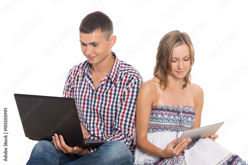 Happy young couple working on PC Happy young couple working on PC