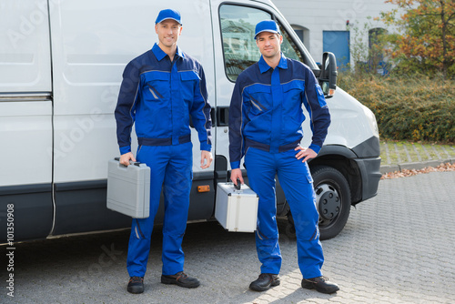 Photography Confident Technicians Standing Against Truck