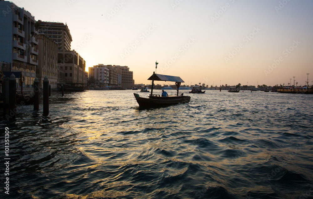 Old Dubai view from water during sunset