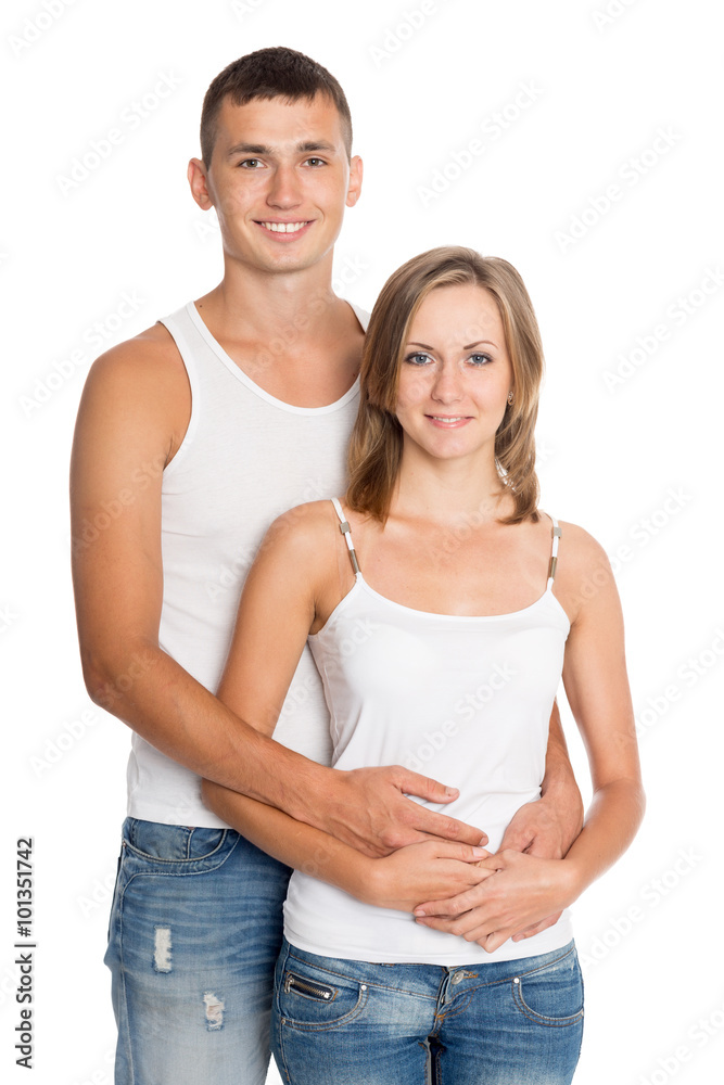 Boy hugging a girl from behind Boy hugging a girl from behind