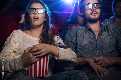 People watching a 3d movie at the cinema