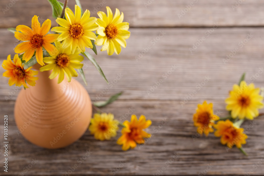Fototapeta premium still life with yellow flowers