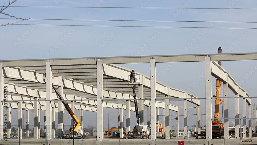 new factory construction site with workers