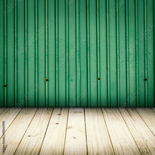 old zinc wall and wooden floor