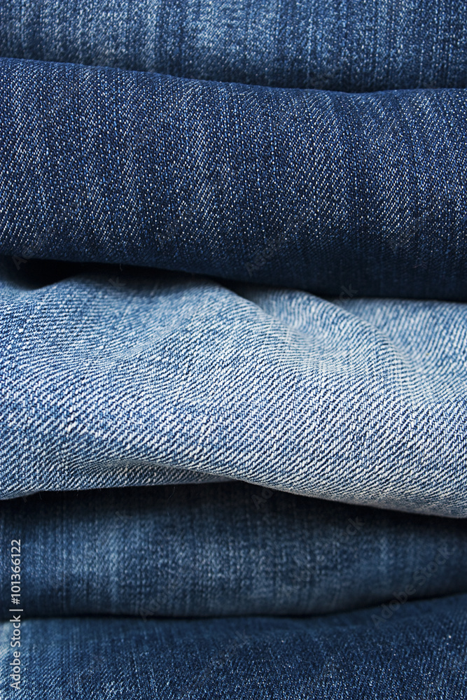 Background of a stack blue jeans