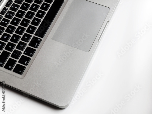Top view of the keyboard of the laptop on white Desk
