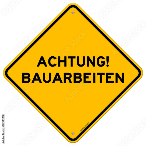 Yellow and black achtung bauarbeiten sign