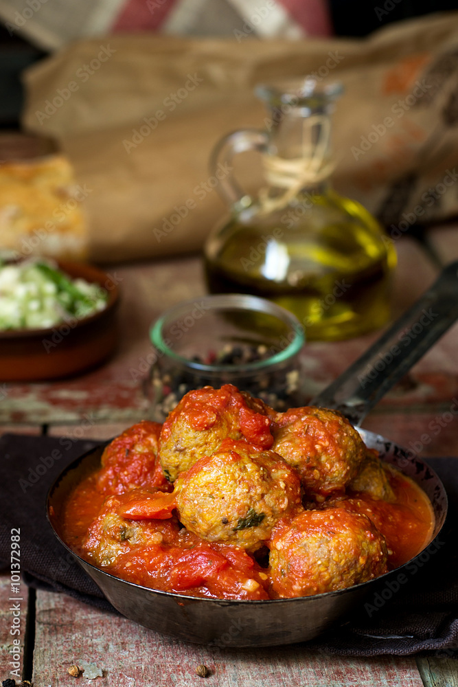 Meatballs with ground pumpkin in tomato sauce