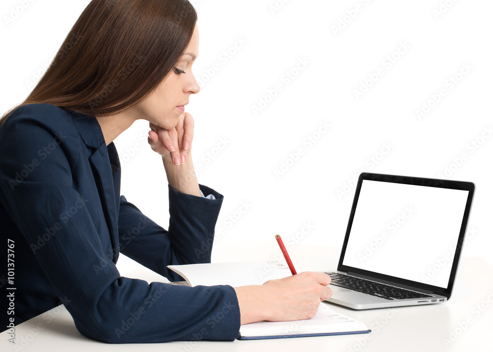 business woman with laptop at the desk business woman with laptop at the desk