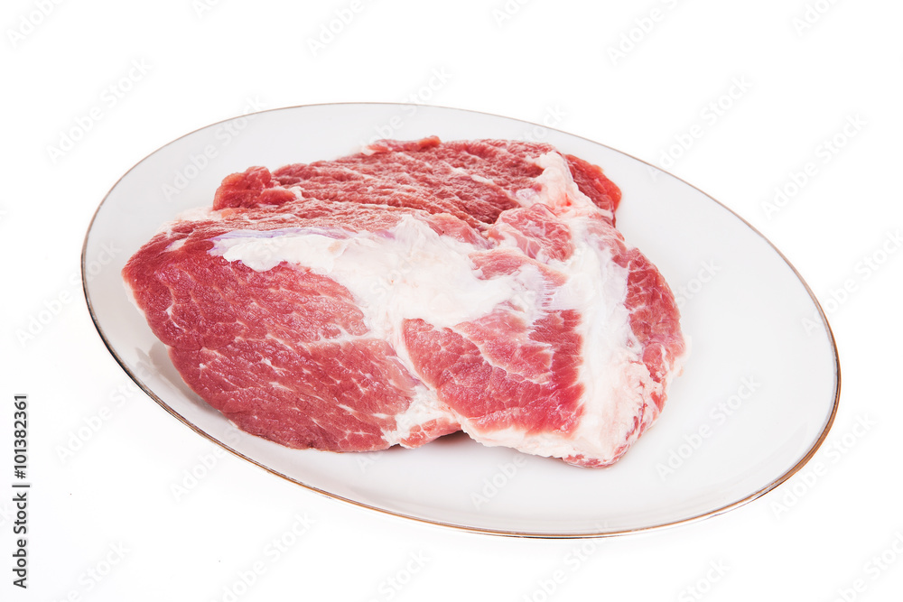 Crude meat on a white backgrounds Crude meat on a white backgrounds
