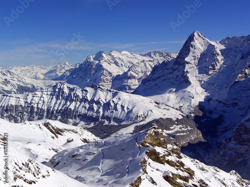 Snowy Swiss alps mountains with blue sky - landscape photo