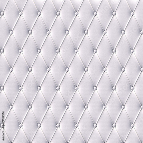 The white leather texture of the skin quilted sofa