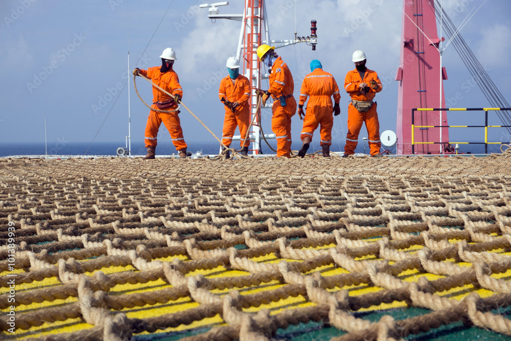 Offshore Workers Working On The Helideck of A Construction Barge Stock ...