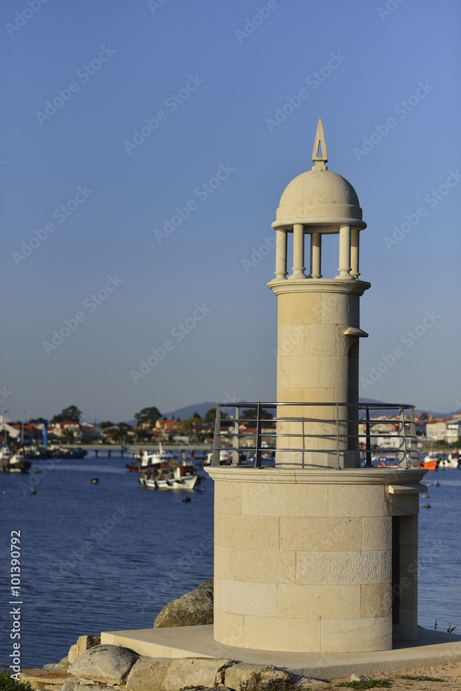 lighthouse in beautiful summer landscape of the Rias Baixas