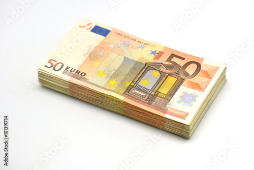 Money pile of 50 Euro banknotes isolated in white