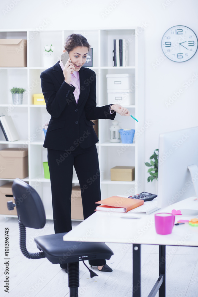Businesswoman working at her office
