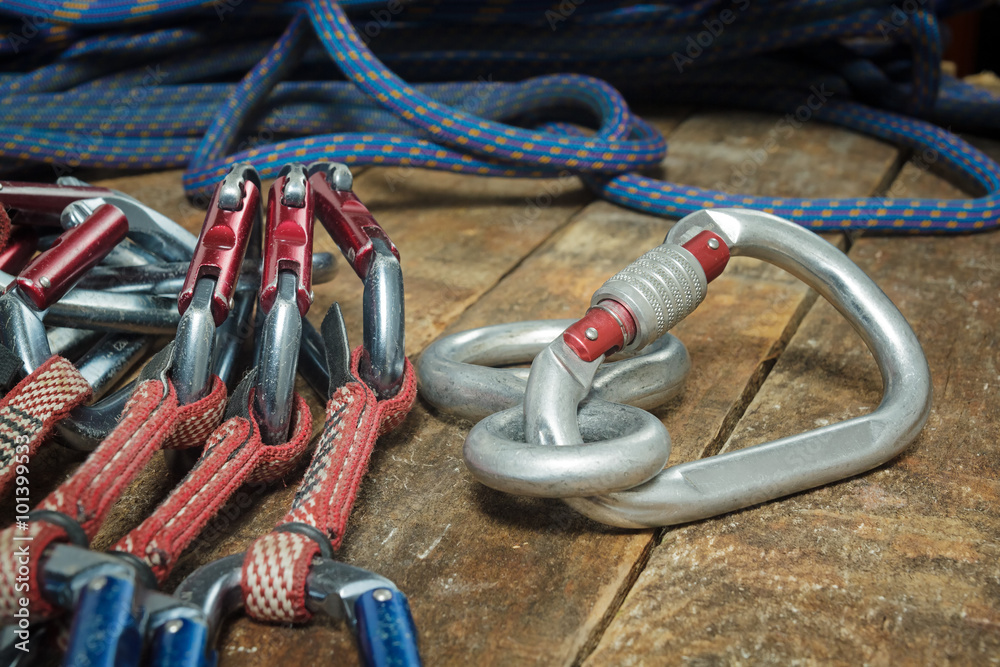 Climbing rope and equipment on wooden boards