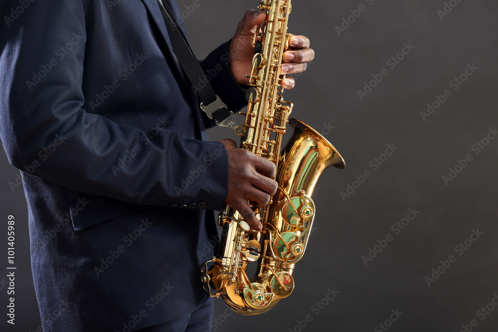Obraz premium African American jazz musician playing the saxophone