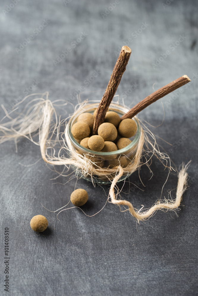 Fotografie chocolate balls with licorice powder
