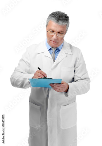 A handsome doctor with clipboard, isolated on white
