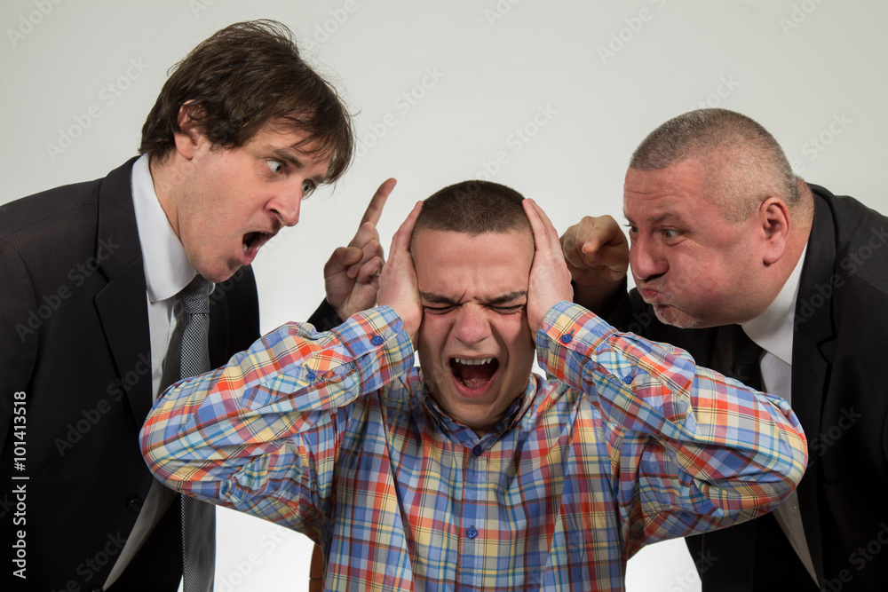 Ταπετσαρία Young man being yelled at by two senior male manager on white