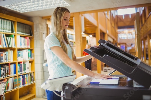 Konstfotografi Smiling blonde student making a copy