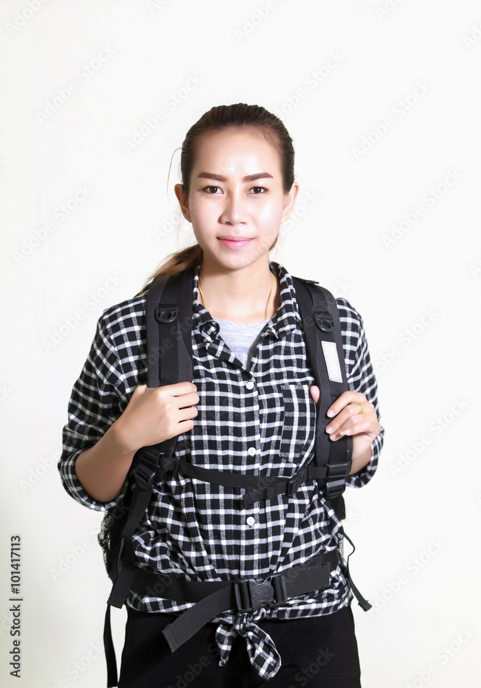 Asian woman carrying a backpack on white background Asian woman carrying a backpack on white background