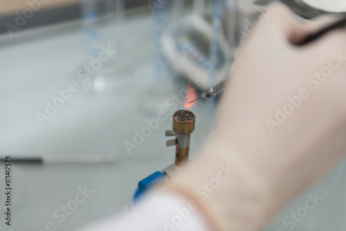 Fototapeta Naklejka Na Ścianę i Meble -  Scientist Doing Experiment In Laboratory