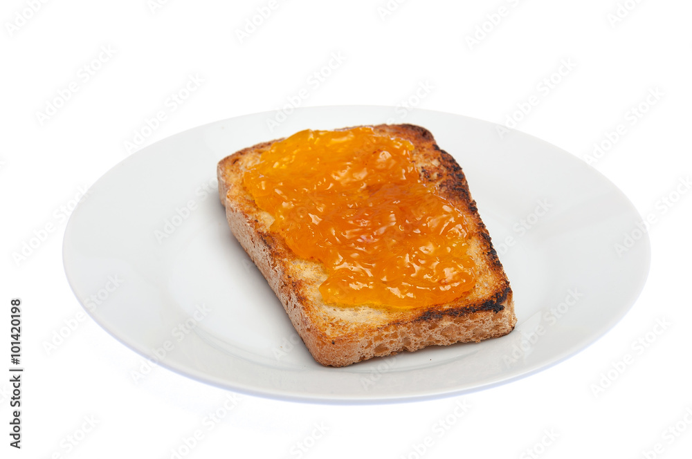 Toasted bread with apricot jam isolated on white. Healthy breakf Toasted bread with apricot jam isolated on white. Healthy breakf