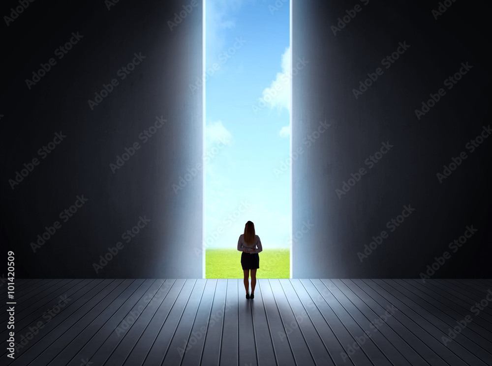 businessman walking to open gate businessman walking to open gate