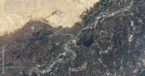 Aerial time lapse of seasonal drought around the Gudu Barrage area of Pakistan's Hindus River. Two versions in clip. Slow pan and slow zoom. Data: NASA. photo