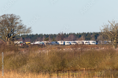 Parked campers at Hornborgasjon in spring photo